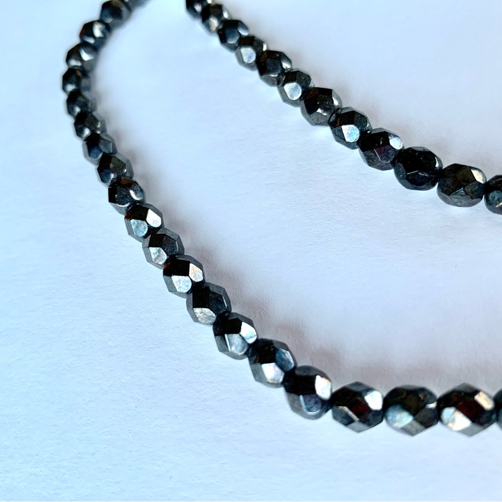 Simple faceted silver hematite bead necklace.